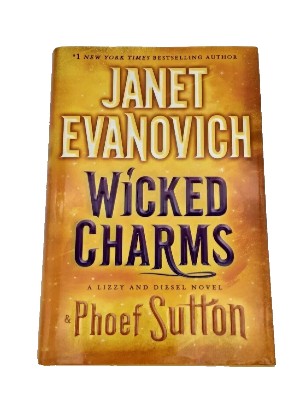 Wicked Charms by Janet Evanovich A Lizzy and Diesel Novel Phoef Sutton