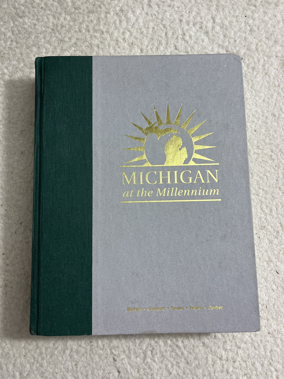 Michigan at the Millennium: A Benchmark and Analysis of Its Fiscal and Economic