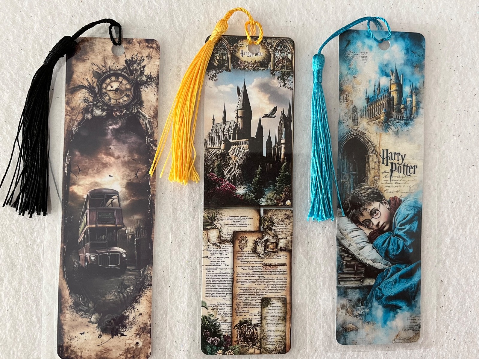 HARRY POTTER COLORFUL VARIETY OF BOOKMARKS set of 3 LAMINATED WITH TASSELS